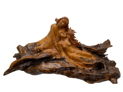 Large 1970s mahogany sculpture of two reclining women shown from the front