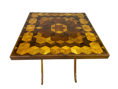 Full top detail showing the square multitone marquetry field and central cube pattern.