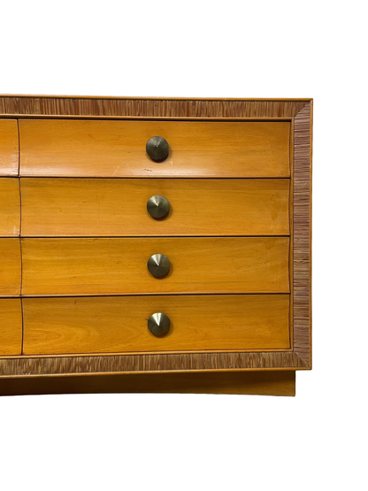 Right-side detail showing four drawer fronts, metal pulls, and the Combed-wood border.