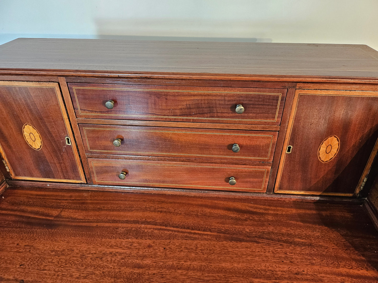 Carlton House Desk in Flame Mahogany | Circa 1920s