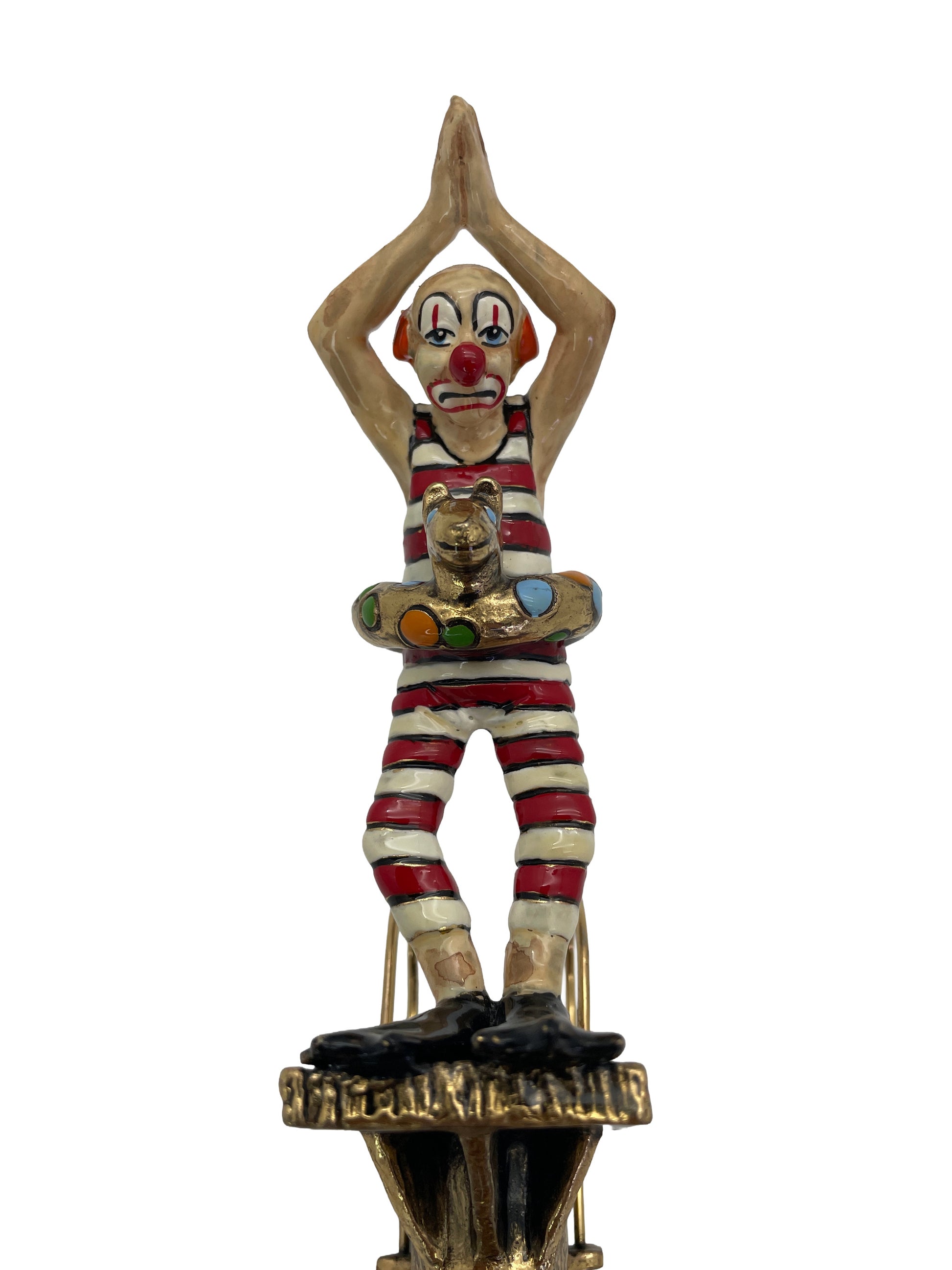 Close-up of the expressive hand-painted clown face and diving pose on Ronald A. Lee’s signed 1983 sculpture.