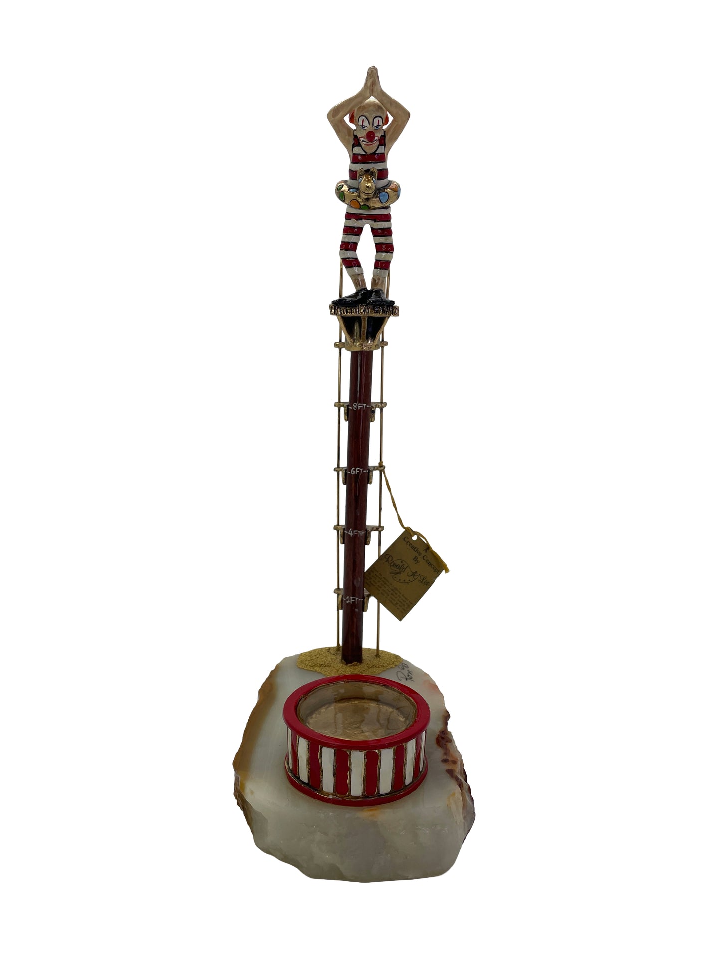 Front view of a signed Ronald A. Lee clown high diver sculpture with 24K gold-plated accents and natural onyx base, dated 1983.