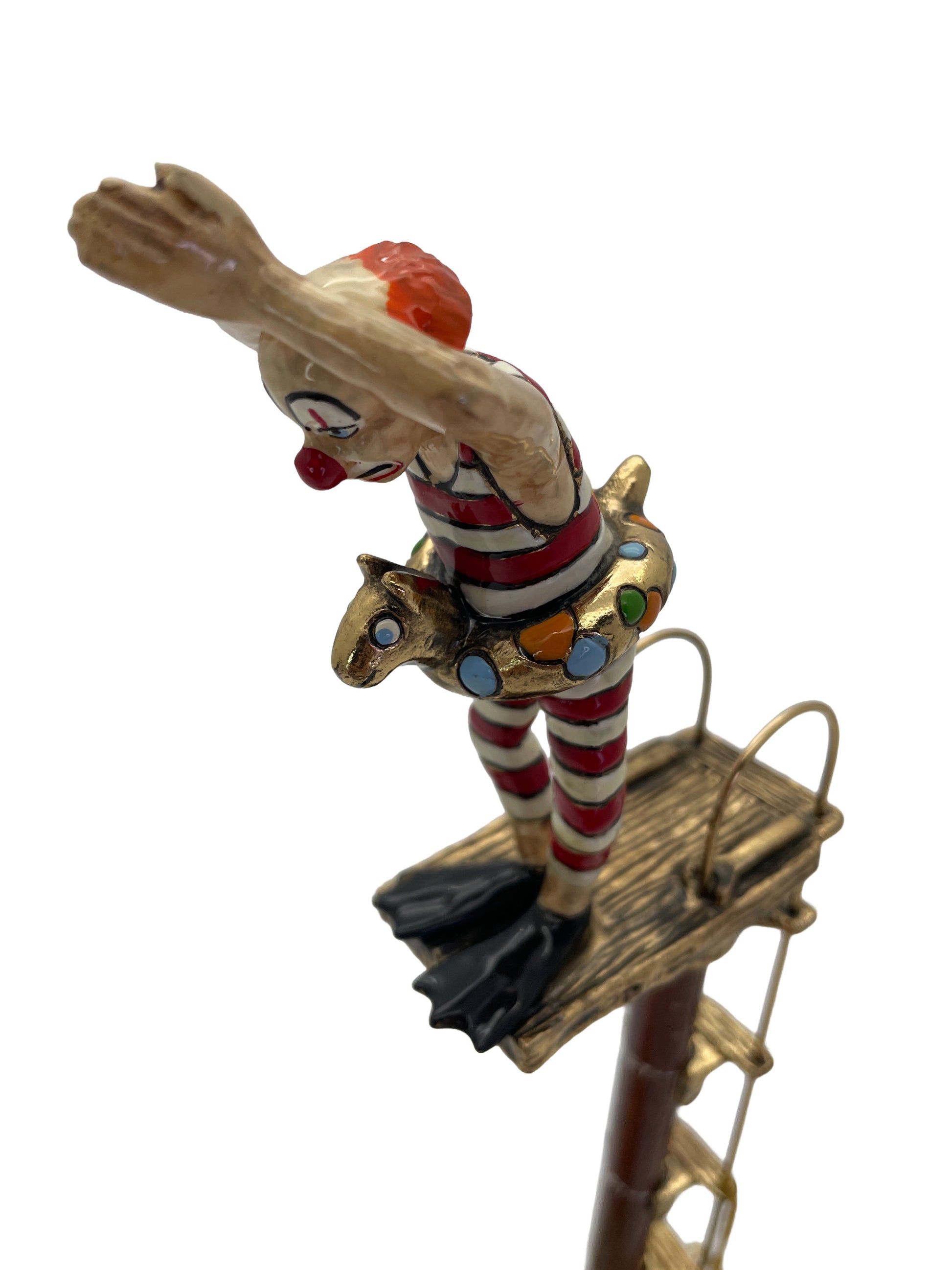 Overhead angle highlighting the diving pose, platform, colorful float, and hand-painted details of the Ronald A. Lee sculpture.