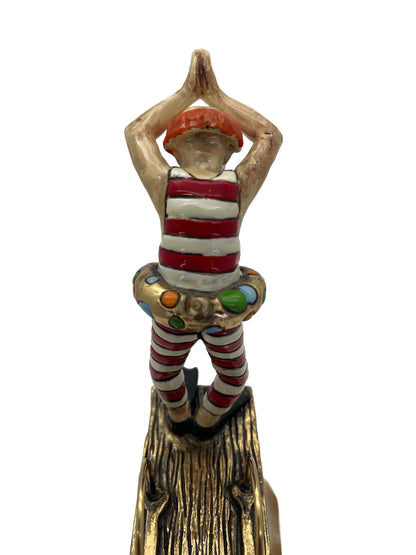 Rear close-up of the hand-painted clown figure standing on the diving platform with colorful gold-plated float.