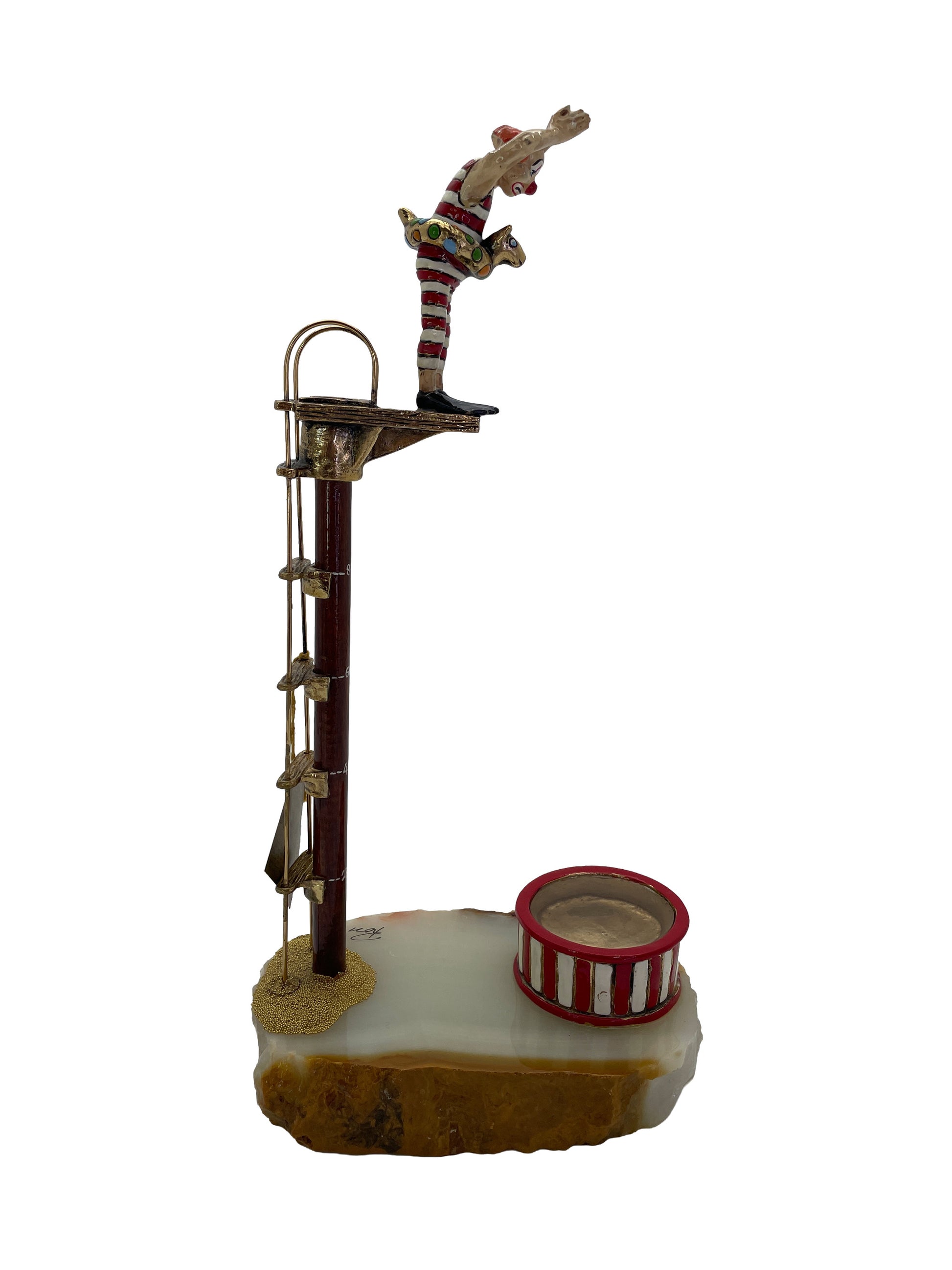 Side view of Ronald A. Lee’s hand-painted circus clown high diver sculpture on a natural onyx base with diving platform.