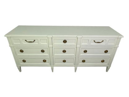 American of Martinsville dresser in off-white lacquer with brass hardware, 1970s top surface
