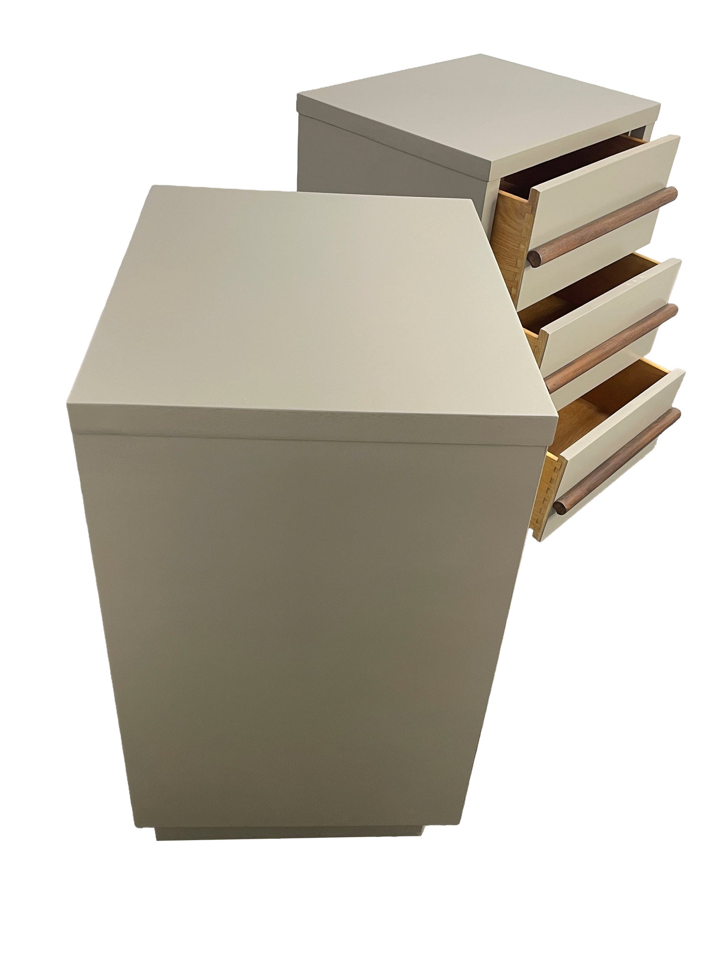 Side view of an American of Martinsville nightstand featuring open dovetail drawers, walnut pulls, and chestnut gray lacquer finish.
