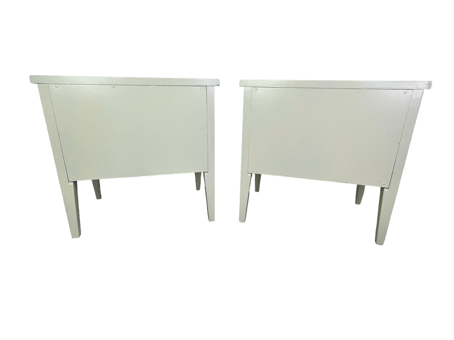 Back side view of American of Martinsville nightstands with tapered legs and fluted detailing

