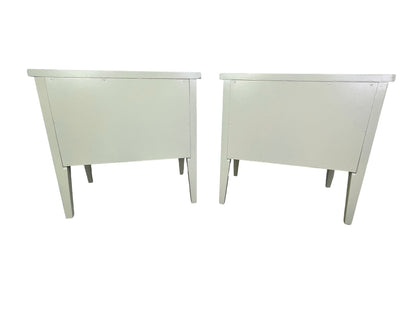 Back side view of American of Martinsville nightstands with tapered legs and fluted detailing
