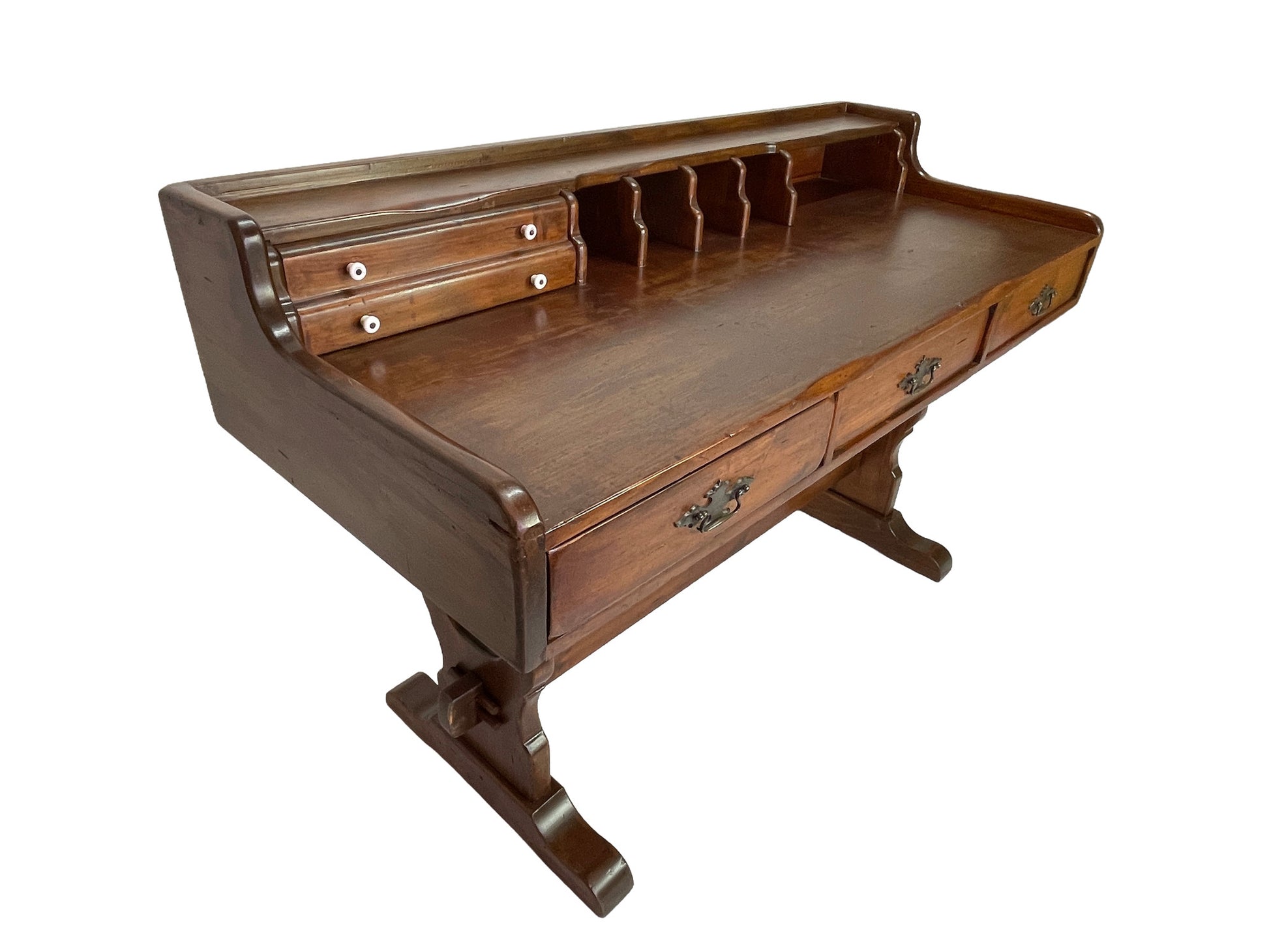 Antique Victorian solid pine writing desk with raised hutch, pigeonhole compartments, porcelain drawer knobs, and brass hardware.