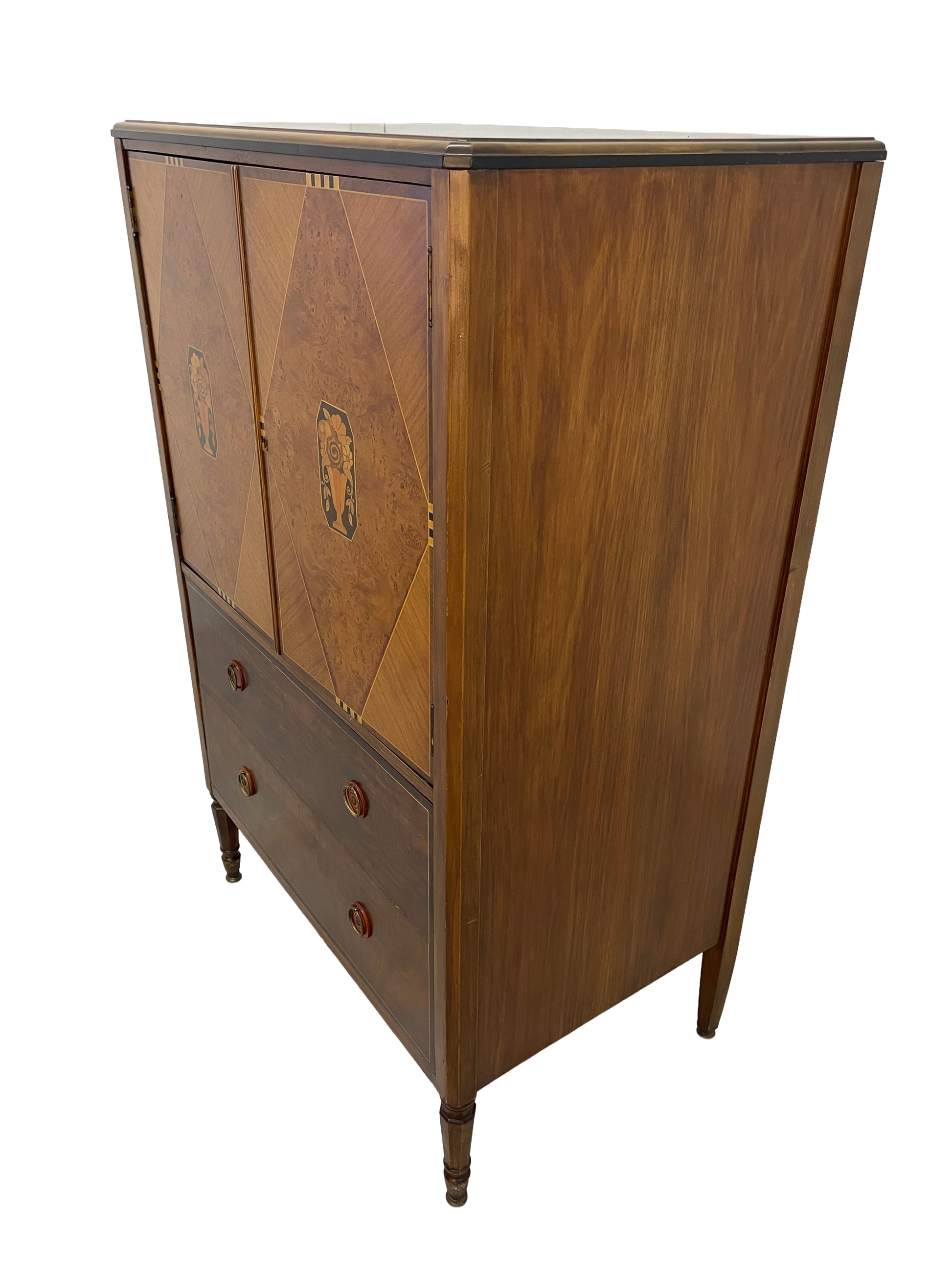 Angled right side view of vintage Sligh cabinet highlighting wood grain and structure