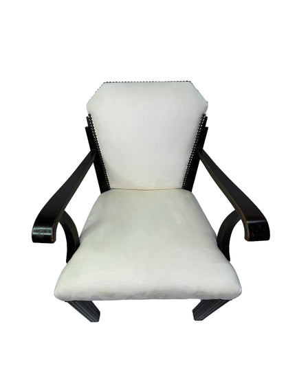 Head-on view of a vintage Art Deco style dining armchair with ivory upholstered seat and back, dark mahogany frame, and curved wooden arms.