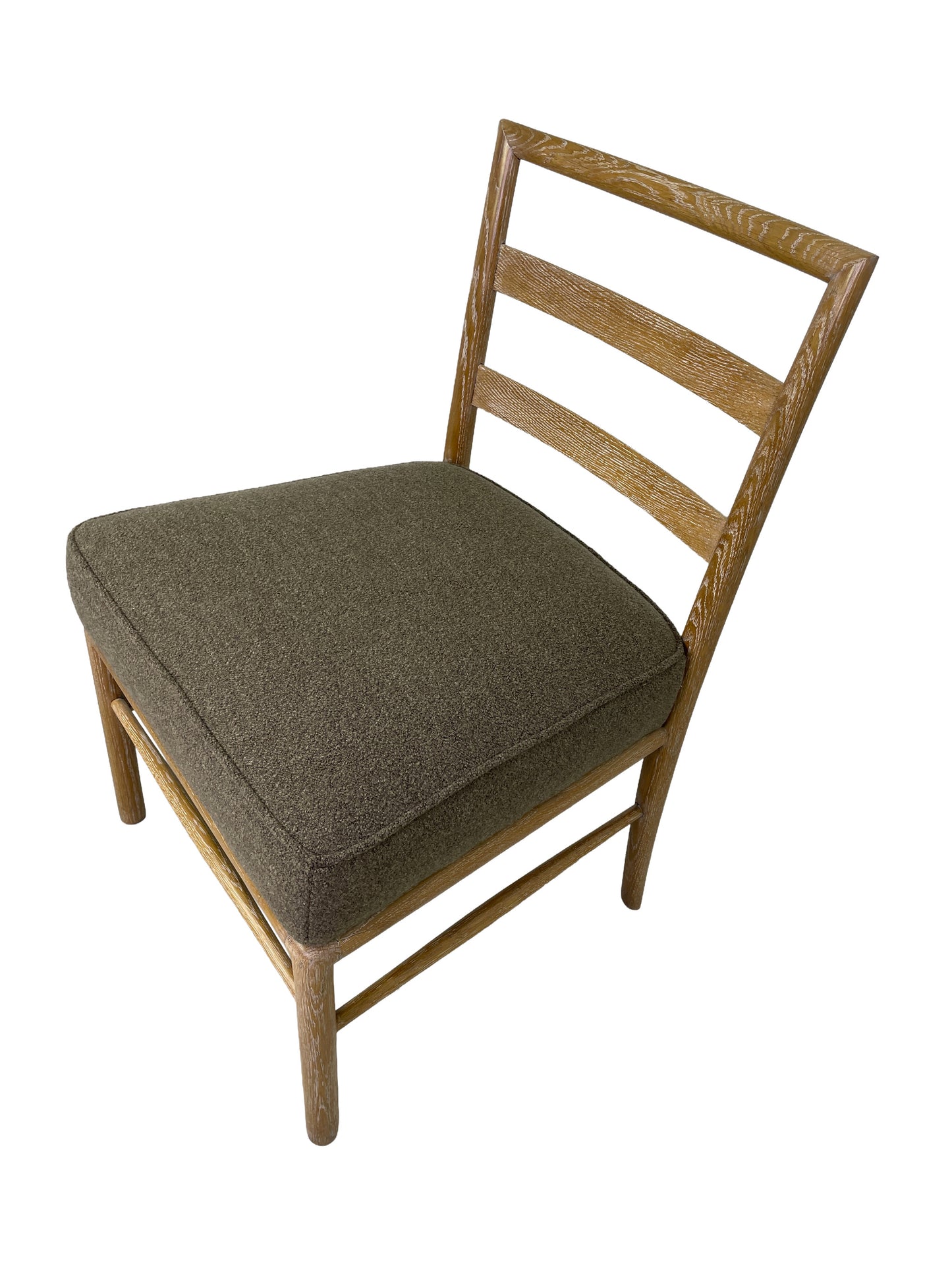 Side view of Danish Modern oak dining chairs with ladder-back design and upholstered seats
