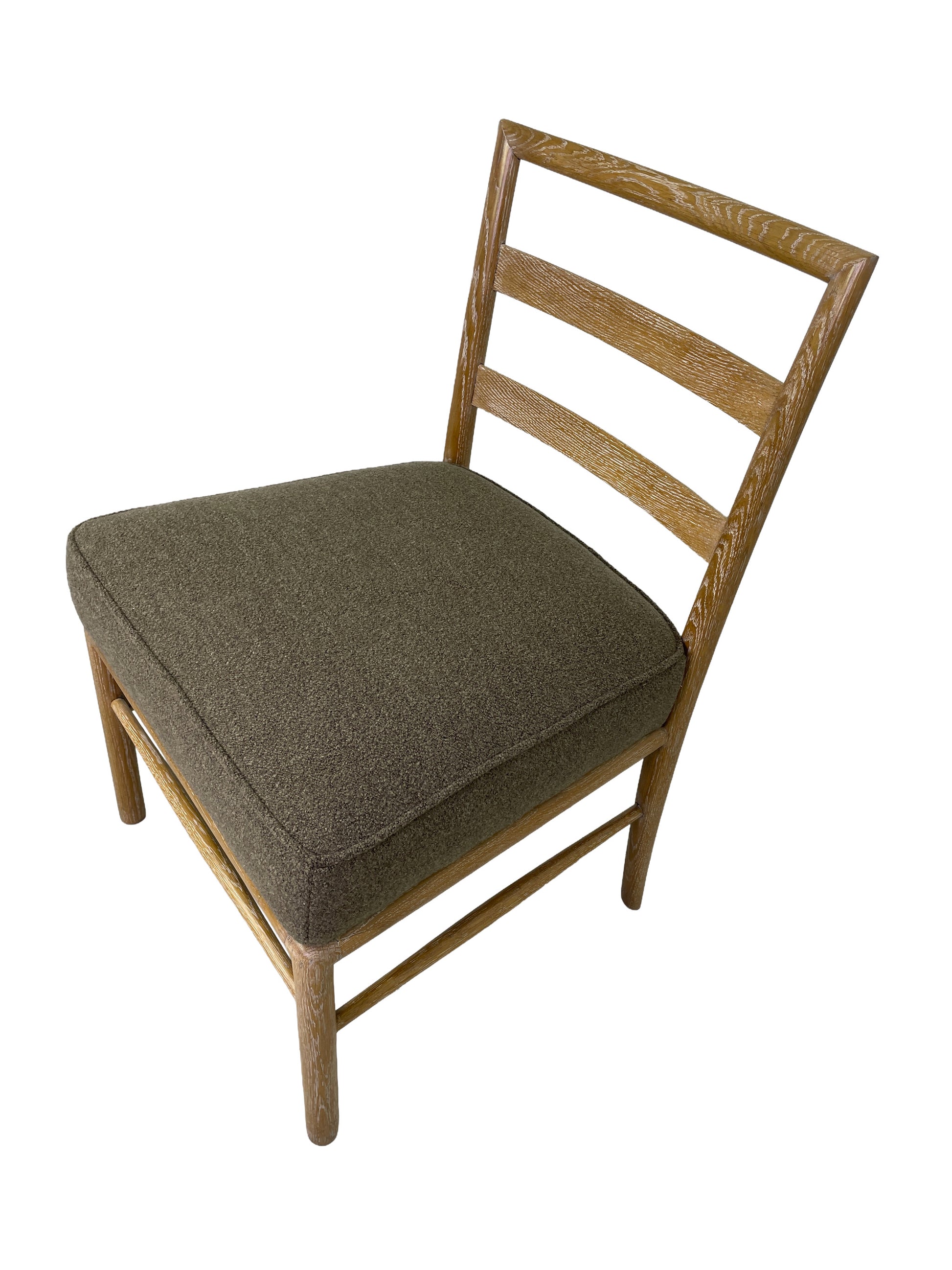 Side view of Danish Modern oak dining chairs with ladder-back design and upholstered seats
