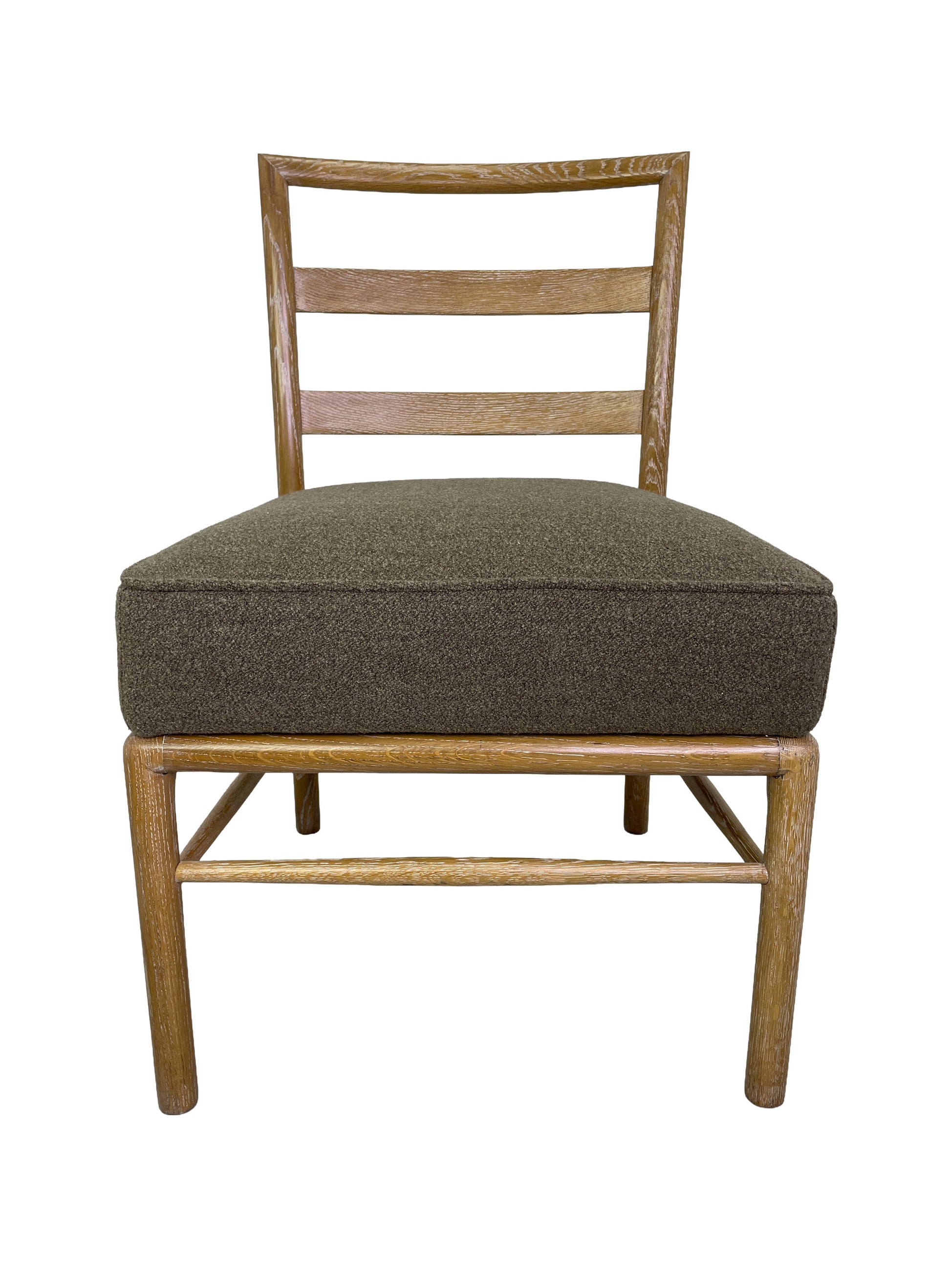Front view of Danish Modern oak dining chairs with ladder-back design and upholstered seats
