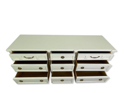 American of Martinsville dresser with drawers open showing clean interiors, off-white lacquer finish top surface
