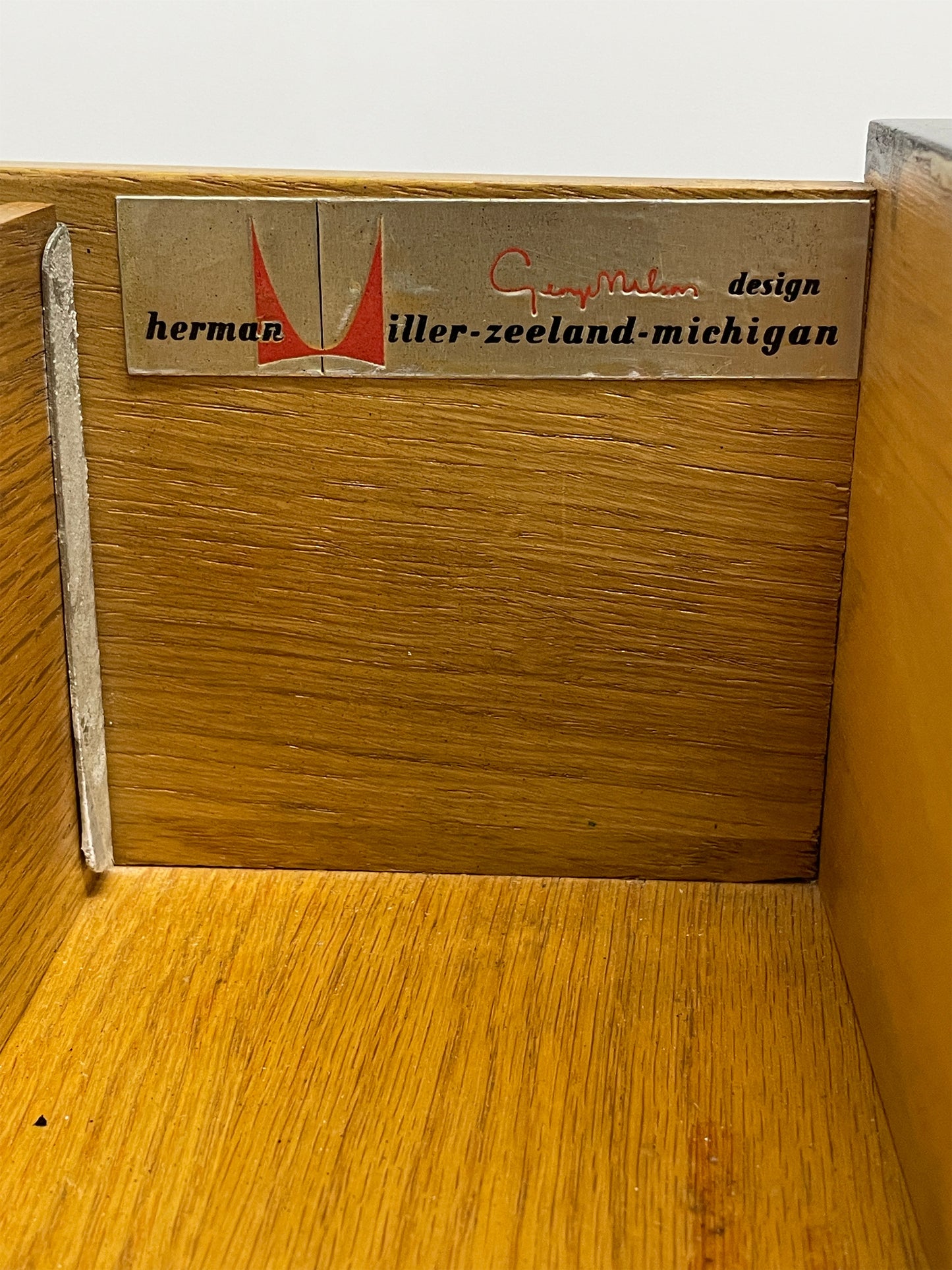 Original Herman Miller label with George Nelson signature inside mid century cabinet