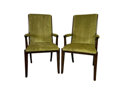 Pair of olive-green dining armchairs attributed to Mastercraft, shown from the front