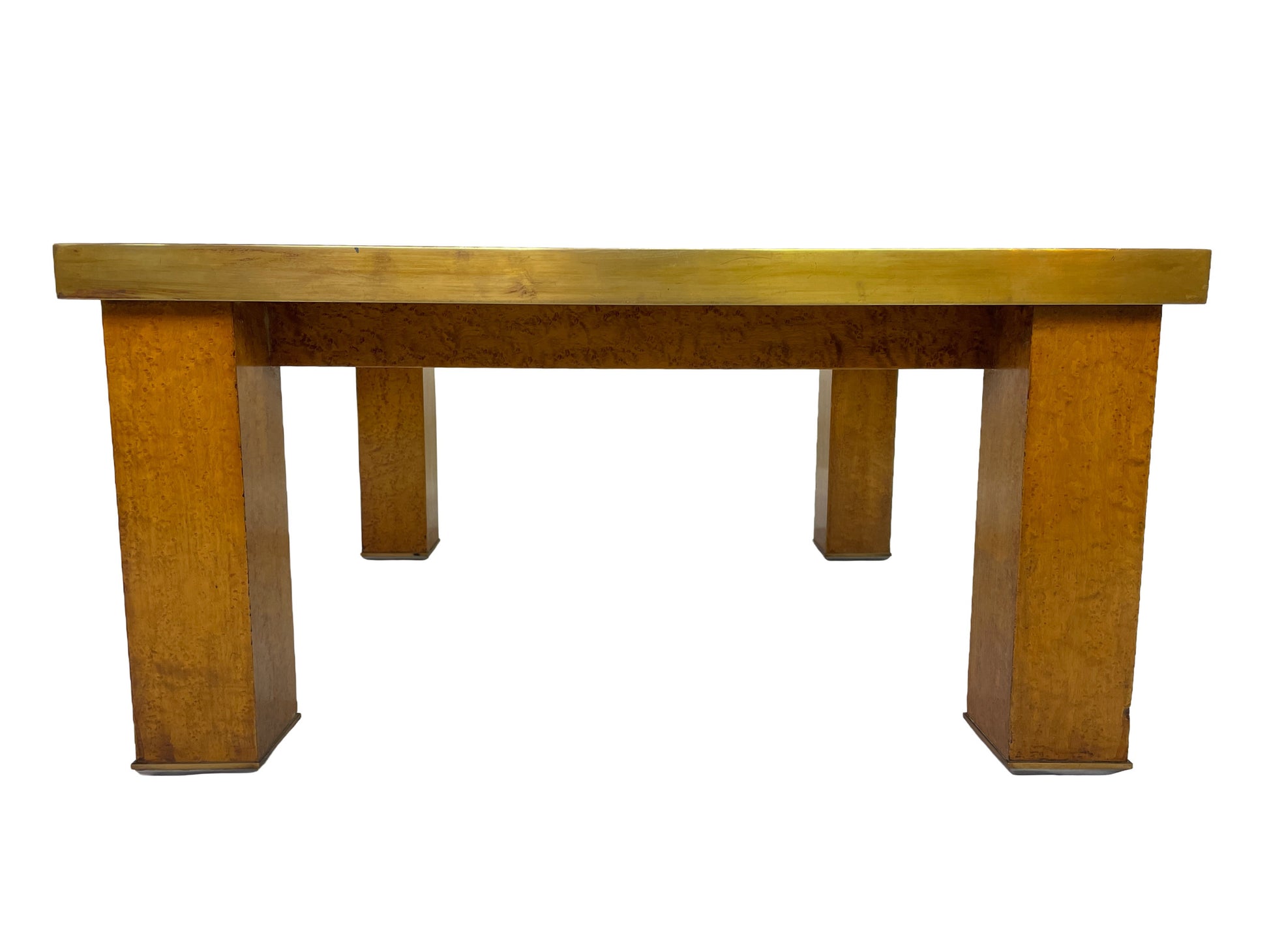 Side profile of a mid-century modern burl wood coffee table with brass trim and architectural legs.