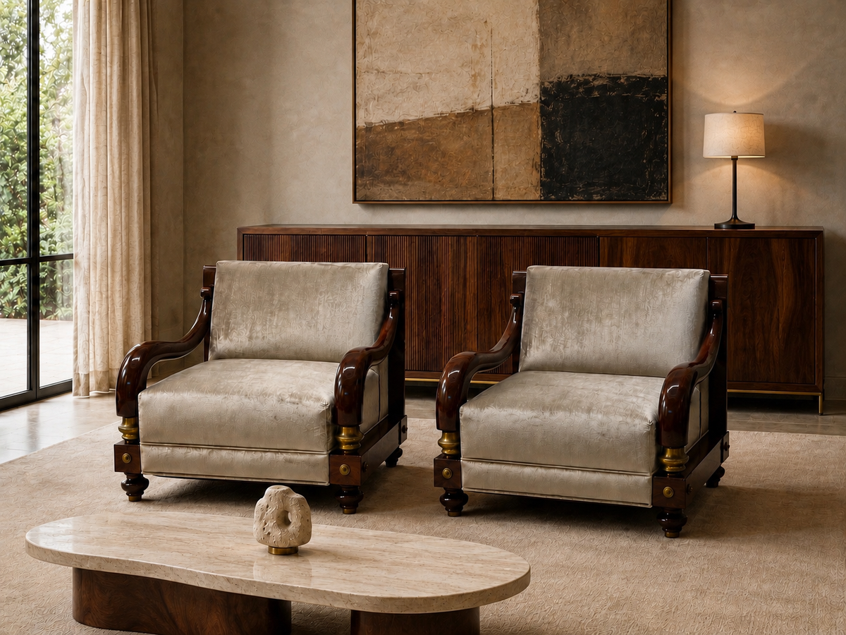 Pair of Octavio Vidales lounge chairs in mahogany with bronze details and taupe velvet upholstery styled in a luxury contemporary living room.