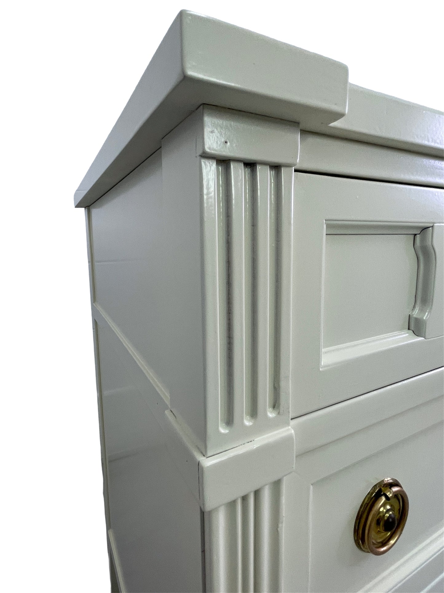 Detail of off-white lacquer finish on American of Martinsville dresser surface
