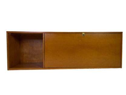 Paul McCobb Planner Group upper secretary cabinet in solid maple with sliding tambour-style panel and open shelving, circa 1950s.