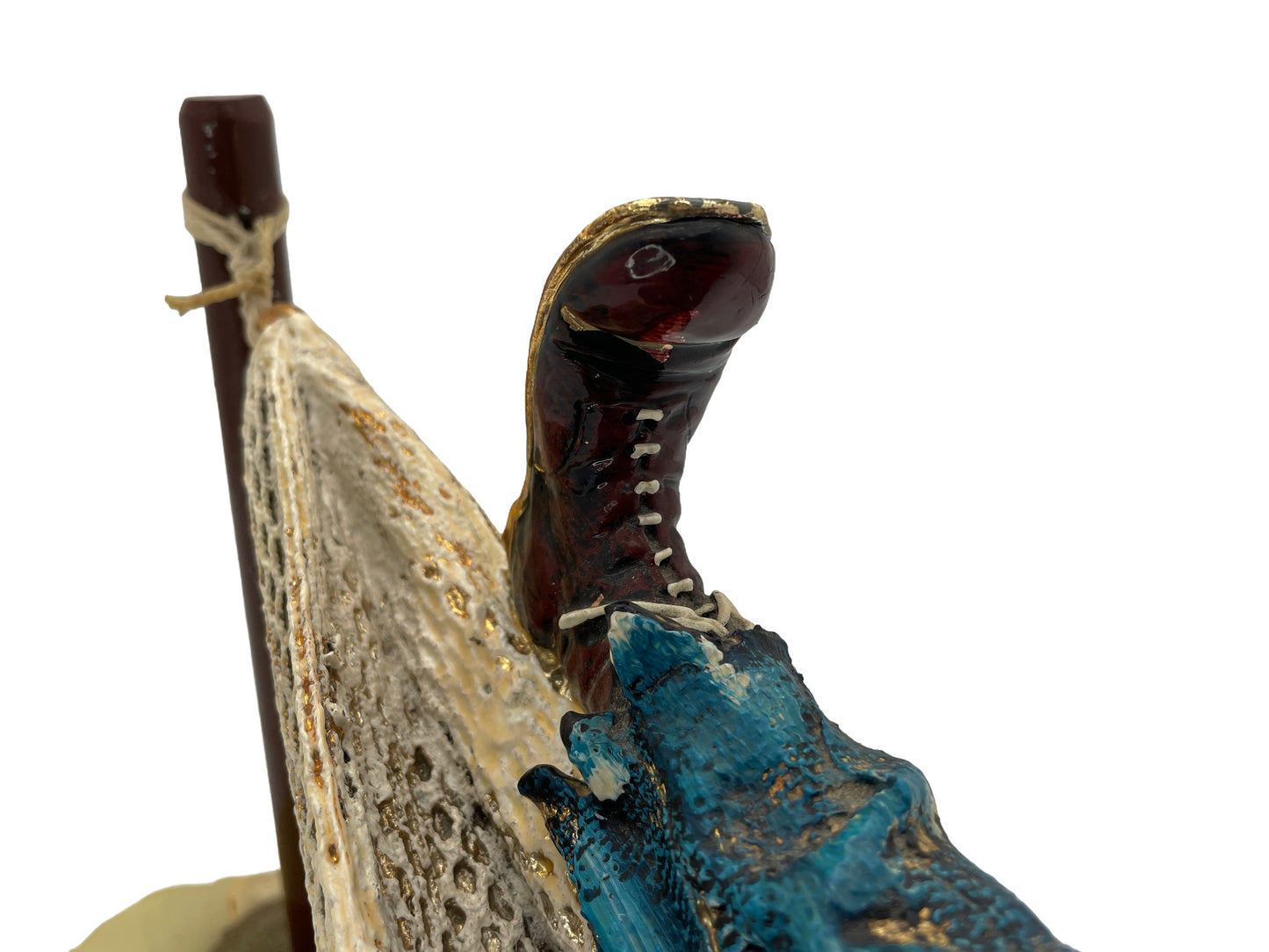 Close-up of the hand-painted clown boot, trouser leg, and woven hammock on a signed Ron Lee 1988 sculpture.