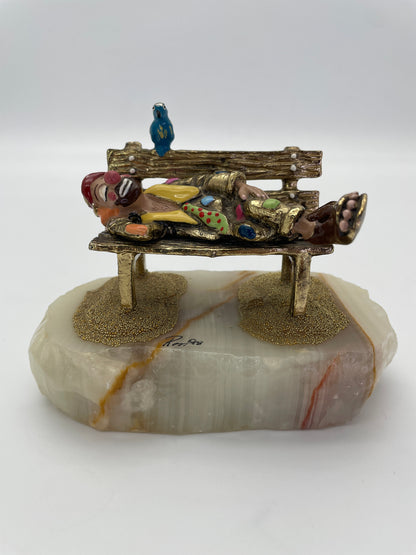 Ron Lee clown on park bench figurine with blue bird, 24K gold-plated finish, hand-painted details, and natural onyx base, signed Ron ’88.