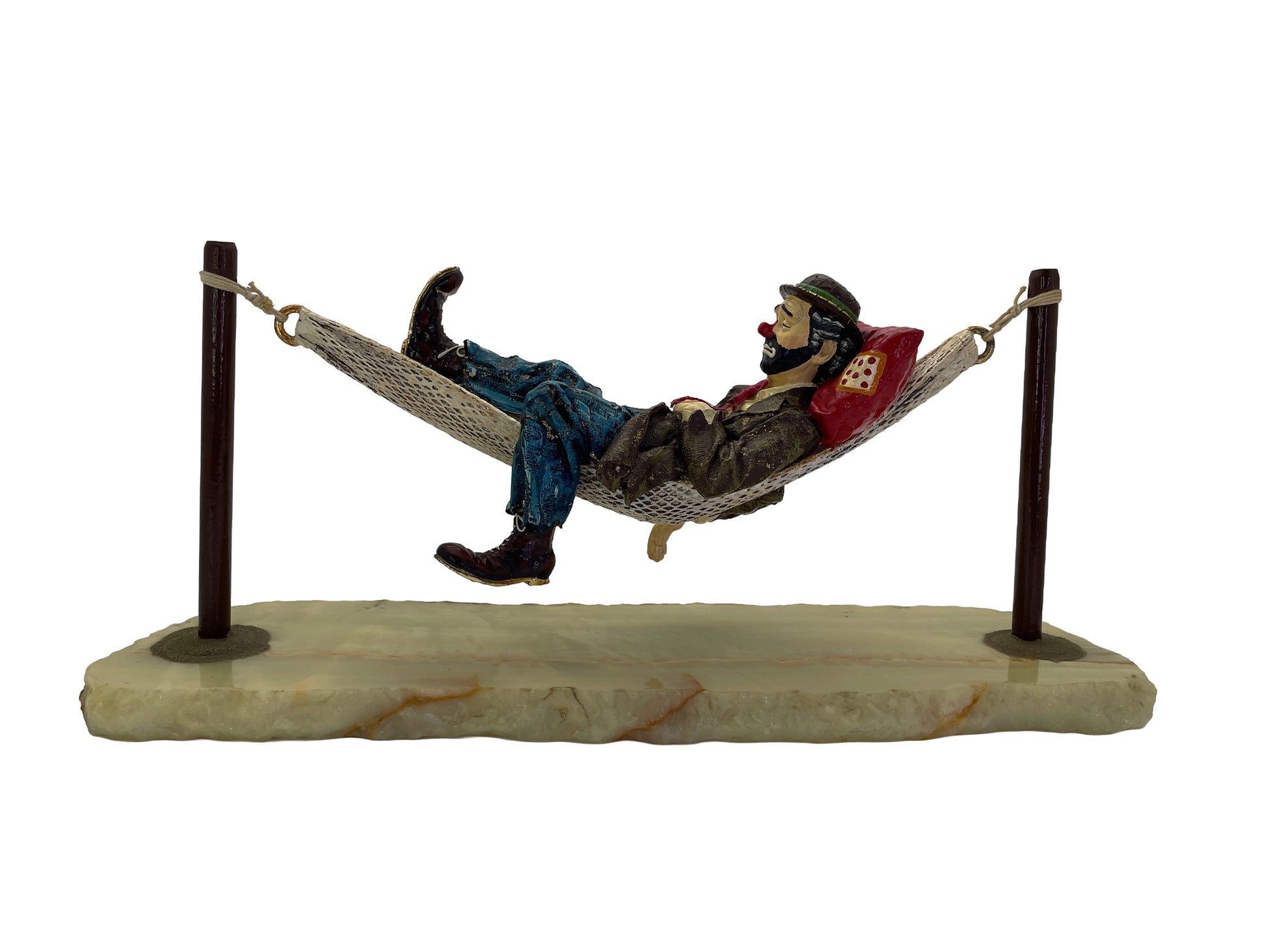 Signed 1988 Ron Lee hobo clown sculpture sleeping in a hammock on a natural onyx base with hand-painted pewter details.