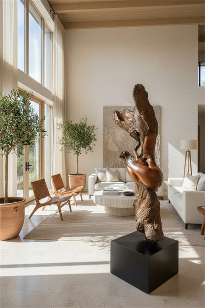 Monumental organic modern wood sculpture by Sig de Tonancour displayed in warm contemporary luxury interior.