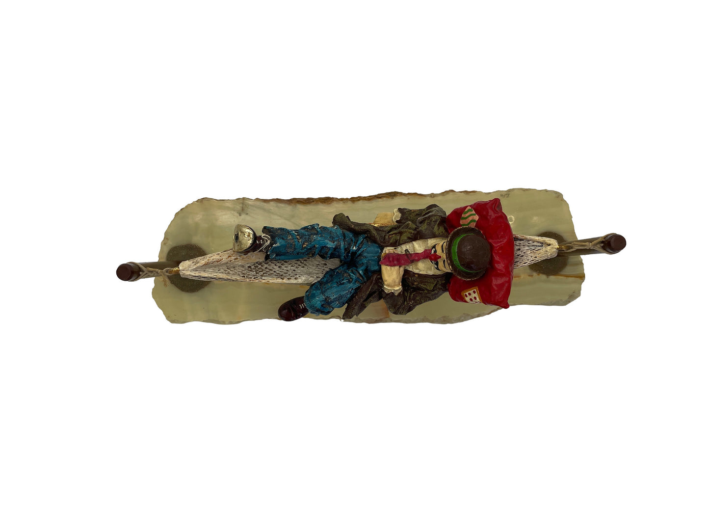 Top view of a signed 1988 Ron Lee hobo clown sculpture reclining in a hammock on a polished natural onyx base.