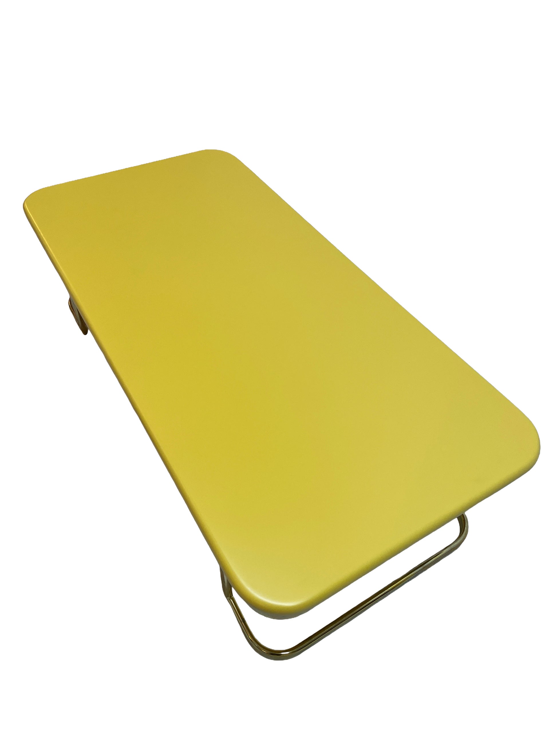 Top angle view of vintage Lane coffee table with rounded lemon yellow lacquer top and brass-tone base.