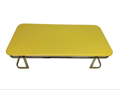 Top front view of vintage Lane coffee table with lemon yellow lacquer surface and rounded corners for living room