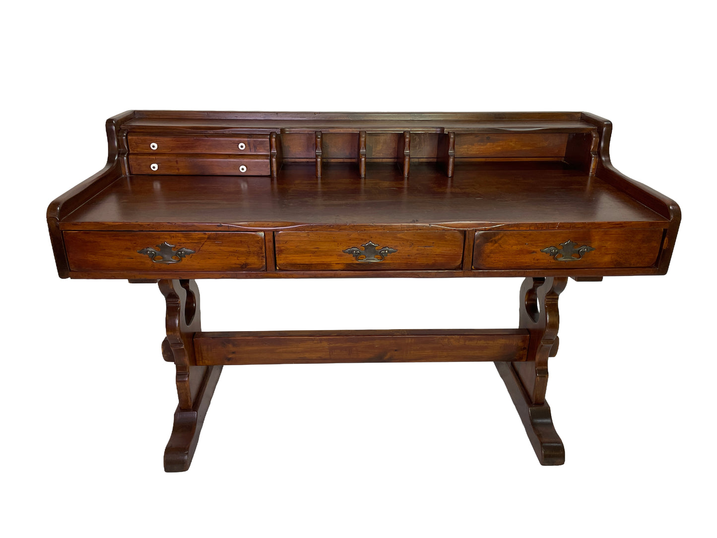 Early 20th century Victorian solid pine writing desk with hutch, porcelain knobs, brass hardware, and original refreshed finish.