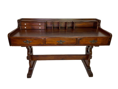 Early 20th century Victorian solid pine writing desk with hutch, porcelain knobs, brass hardware, and original refreshed finish.