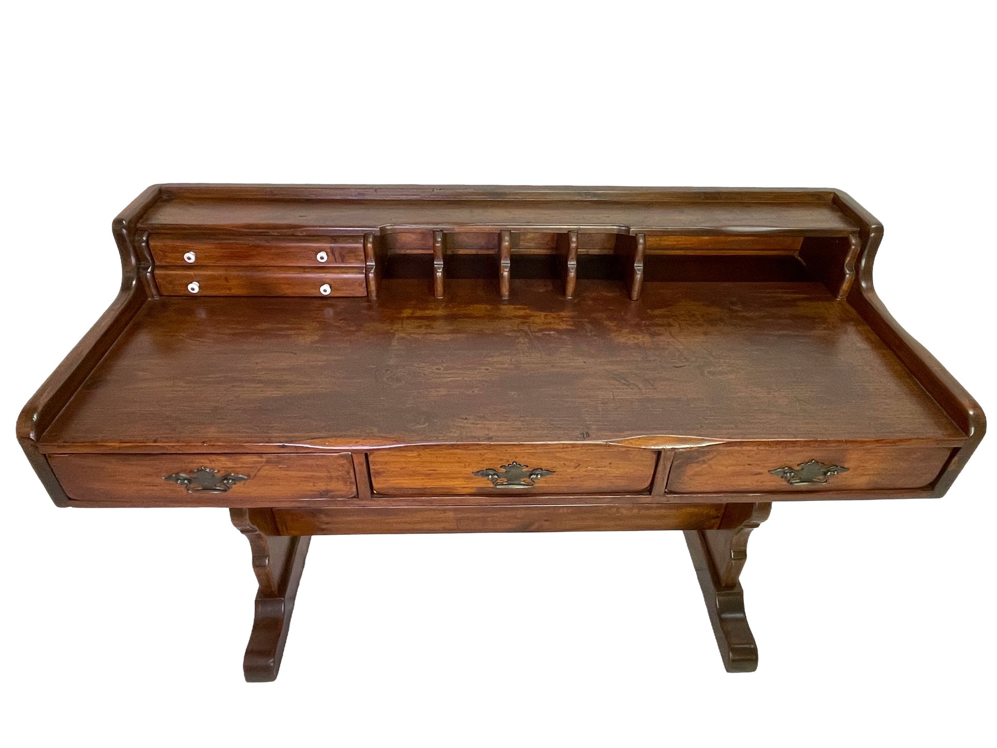 Victorian pine writing desk featuring a spacious writing surface, upper storage compartments, and small document drawers.