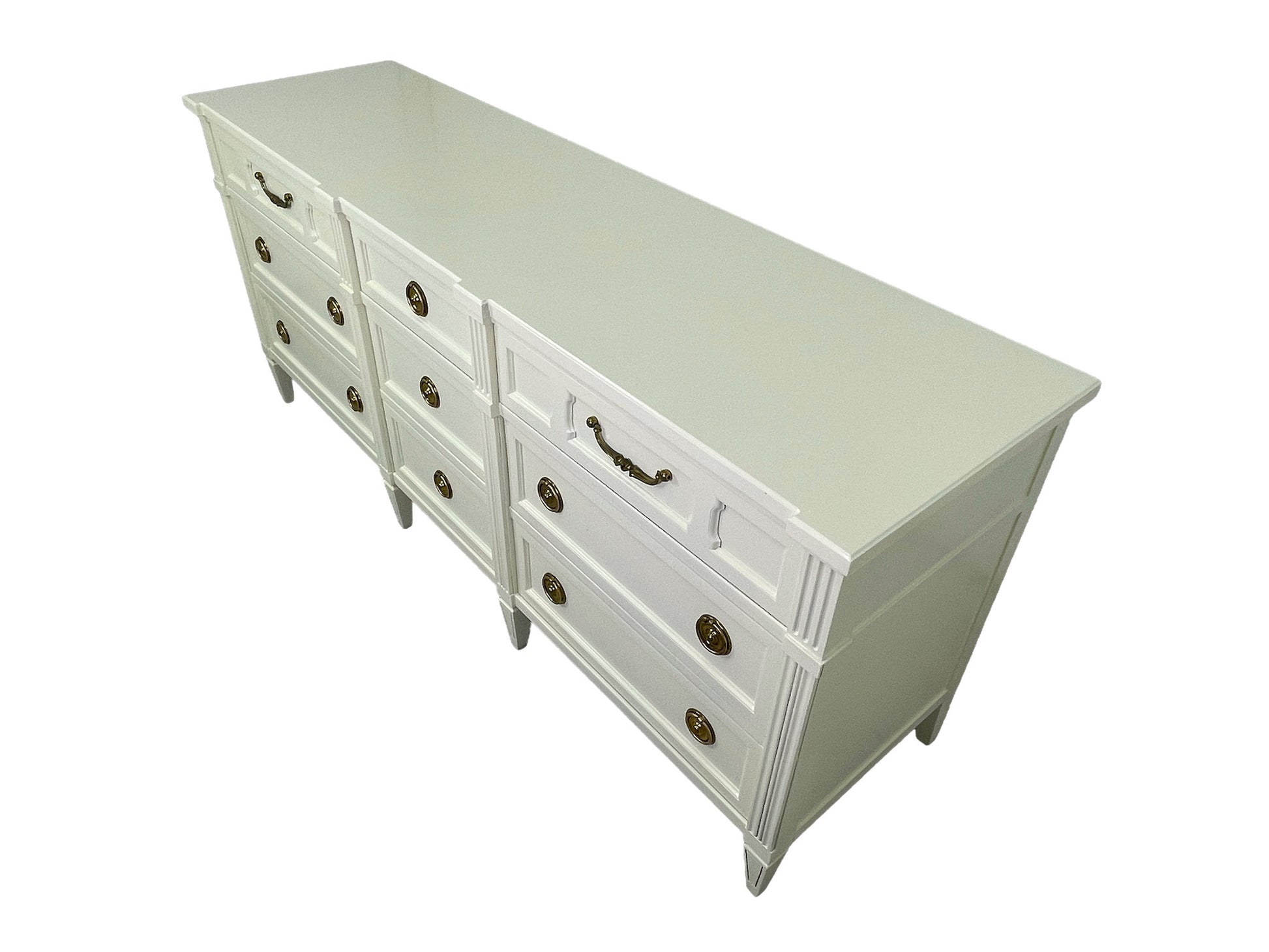 American of Martinsville lacquered dresser in off-white with brass hardware, angled view right side

