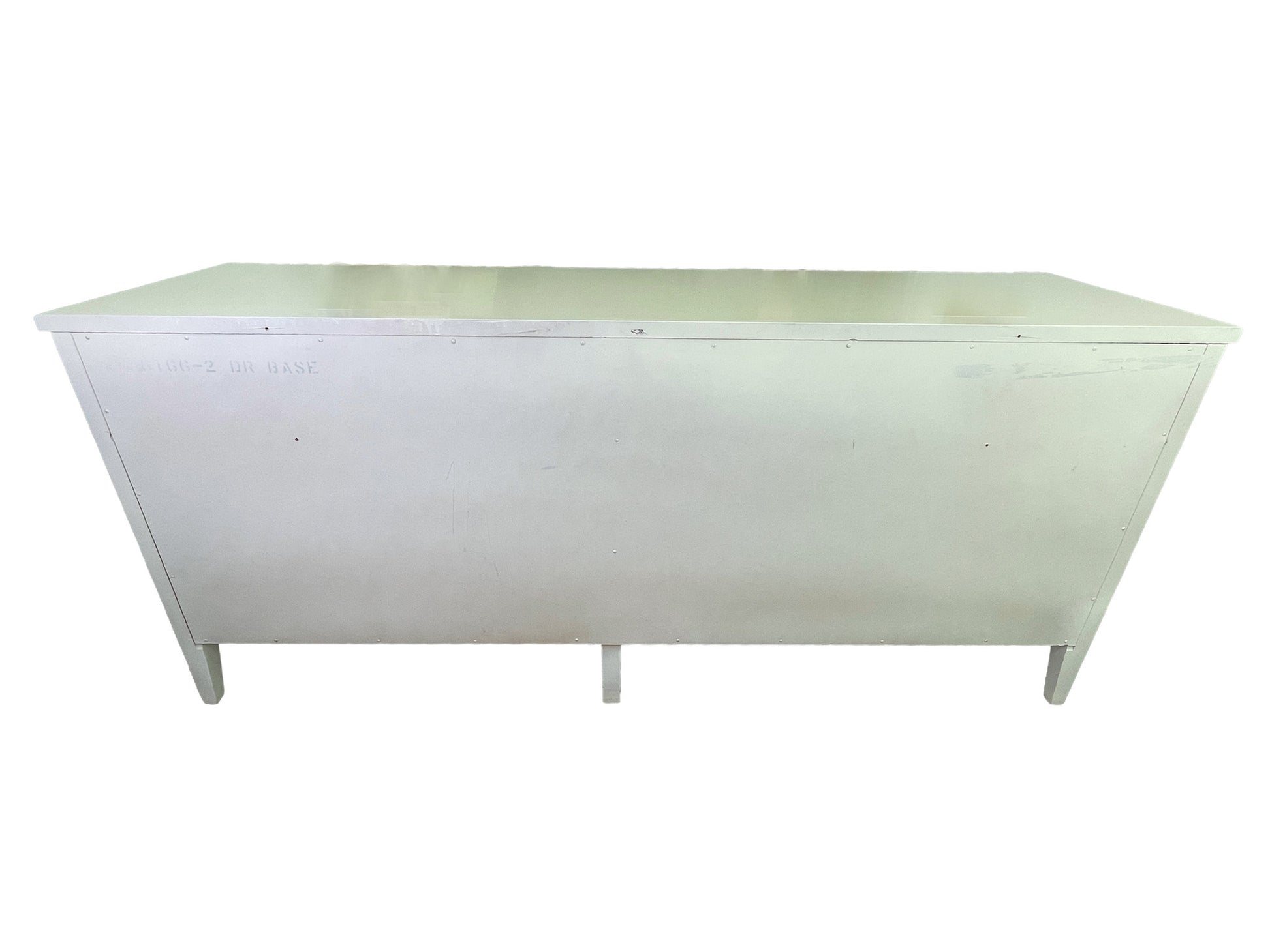 Back side of American of Martinsville dresser in off-white lacquer
